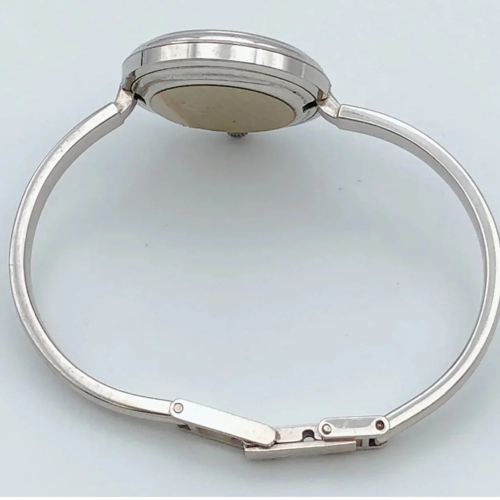 Gucci Silver Bracelet Watch with all bezels shown